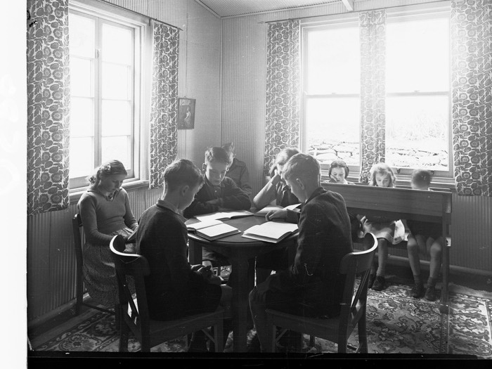 Pupils reading at a school table